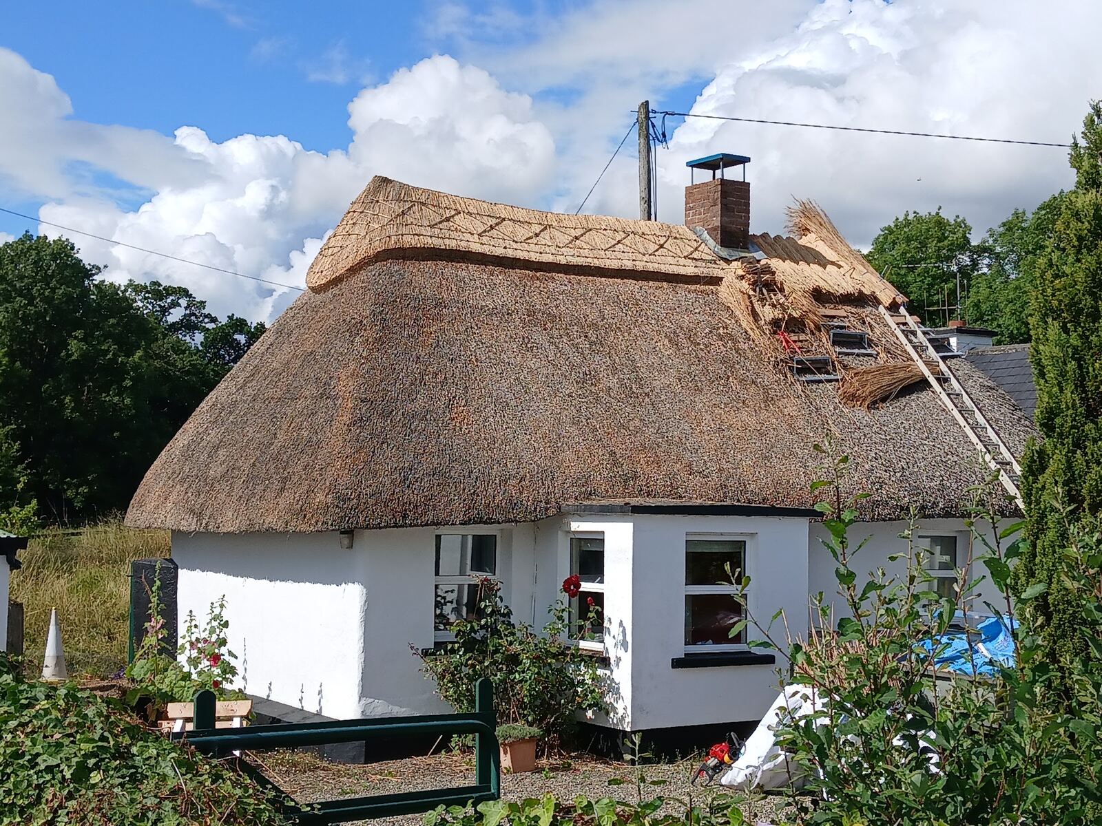 Water reed thatching in progress by Mike, Dromineer